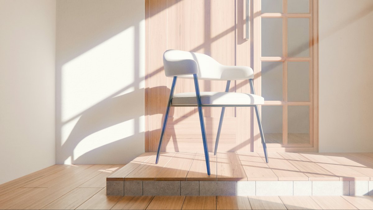 A single empty chair in a bare room in warm sunlight
