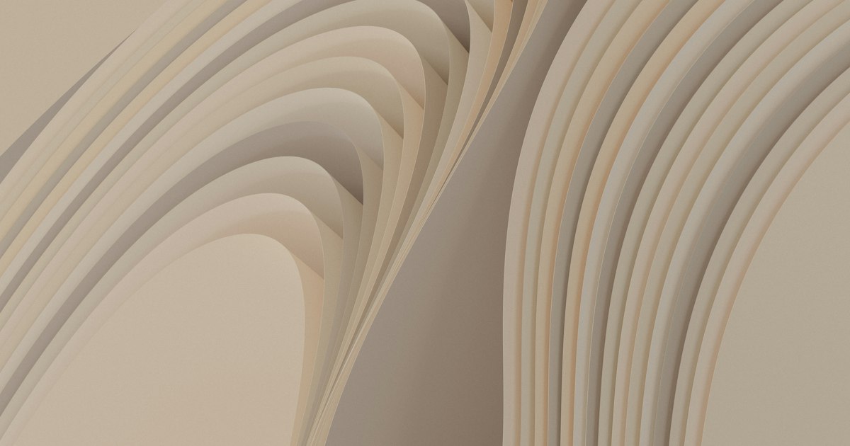 Layered cream and sand coloured curves folding back on themselves